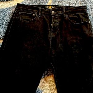 Like new men’s Lucky Brand 76 Slouch Skinny button fly jeans